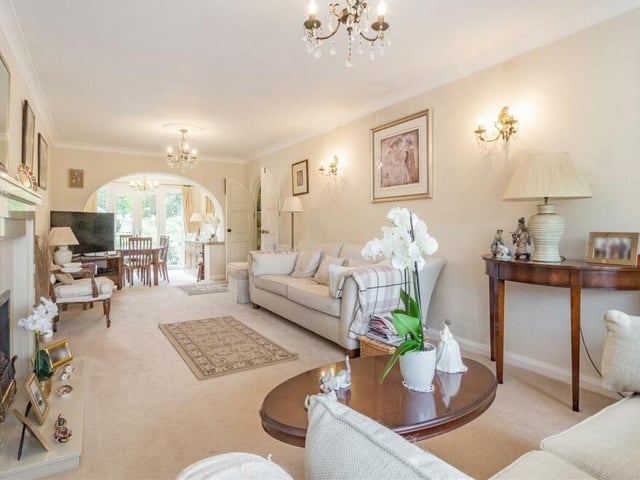 A second shot of the lounge, which features a stunning marble fireplace with inset coal-effect gas fire.