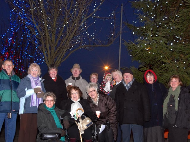 Mansfield Woodhouse Christmas lights switch on. Organisers and visitors to the lights switch on gather around the Christmas tree in 2010.