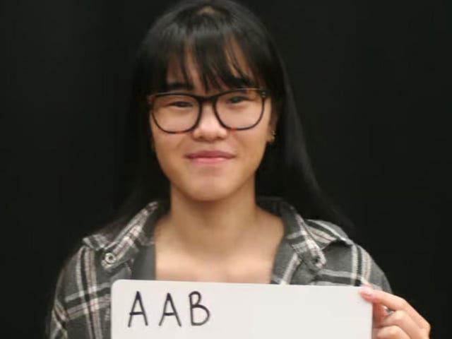 Hall Park student Jenny Huang with her tremendous results in 2022 that saw her heading to University College London.