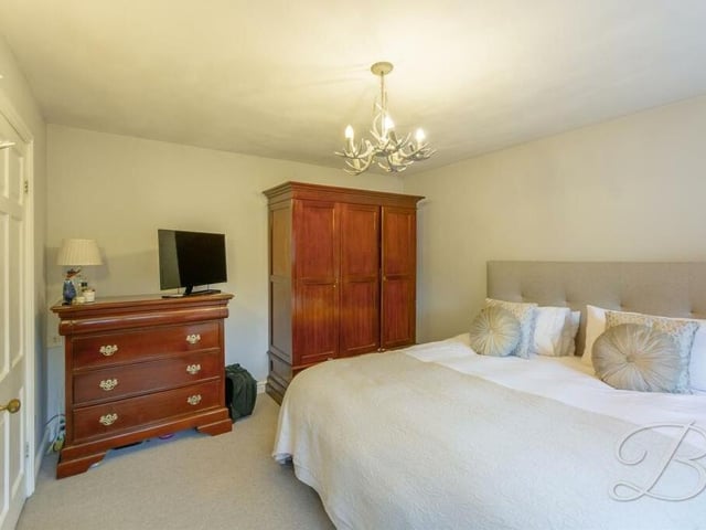 A second look at the charming master bedroom, which has space for wardrobes, drawers and other furniture. It also has a carpeted floor and access to a private en suite shower room.