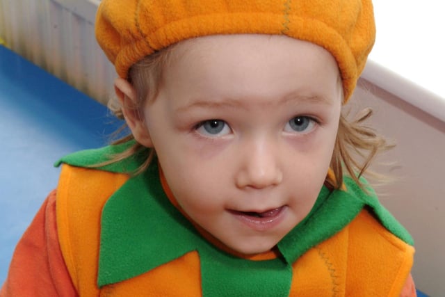 2006: this little girl dressed up as a pumpkin at a Hallowe’en party at Hucknall Day Nursery.
