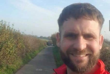 Daz Smith running to help baby Jaxson Potts who has a rare genetic condition