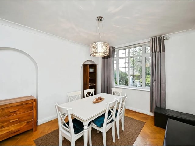The dining room offers a lovely spot for family meals or entertaining.
