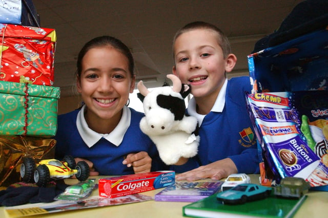 Pupils had fun packing the presents for the 2003 appeal at St Oswald's RC Primary School in South Shields.