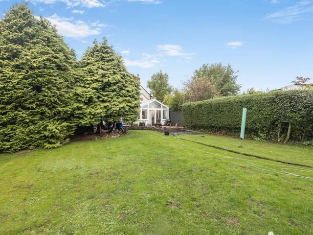 Whether you wish to host gatherings, cultivate a garden, or simply soak up the sun, this space offers endless possibilities.