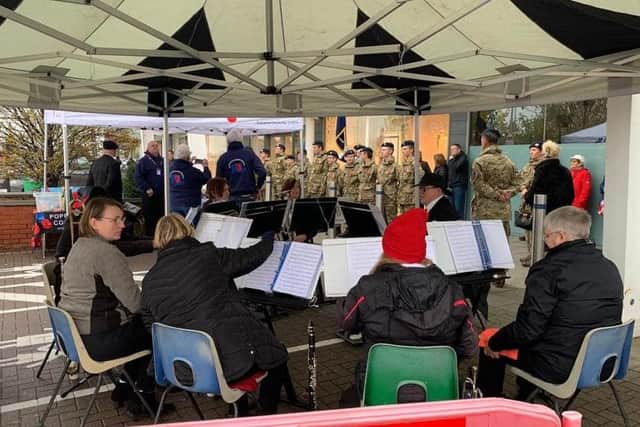 A brass band played at the launch of the Poppy Appeal.