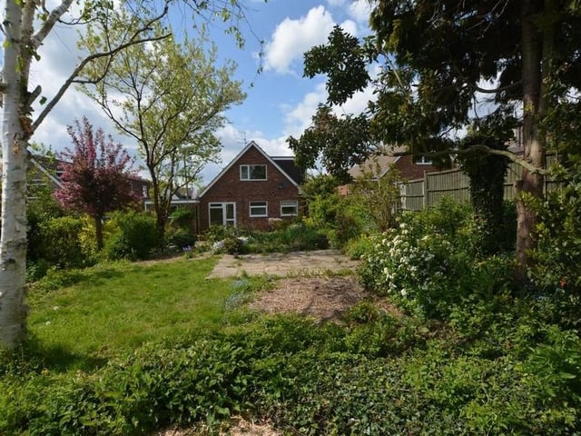 Our last shot of the Southwell bungalow shows a view from the rear. Note how private and enclosed the garden is.