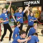 The dancers from Queen Elizabeth School school drop into the Four Seasons Shopping Centre to perform as part of their Dance Dash fundraiser for Children in Need