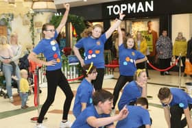 The dancers from Queen Elizabeth School school drop into the Four Seasons Shopping Centre to perform as part of their Dance Dash fundraiser for Children in Need