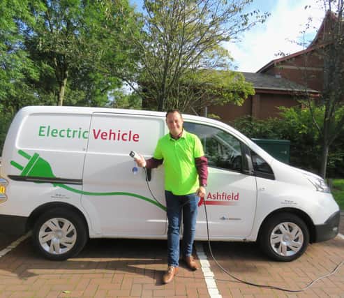 Coun Jason Zadrozny with the council's electric vehicle