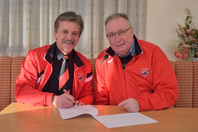Rudy Funk with AFC chairman Andy Saunders as he joins the Bulls.