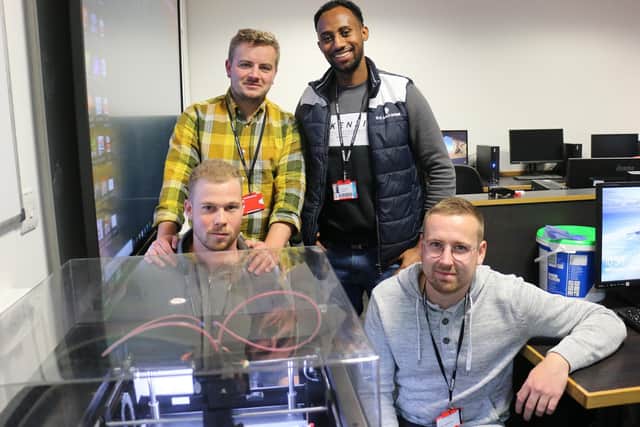 David Stenzel with advanced engineering students Ghrmay Kibreab, Max Blasche and Simon Heitkamp.