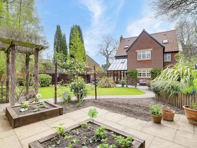 A second shot of the immaculate rear garden. Lots to explore, even at night because there is outdoor lighting.