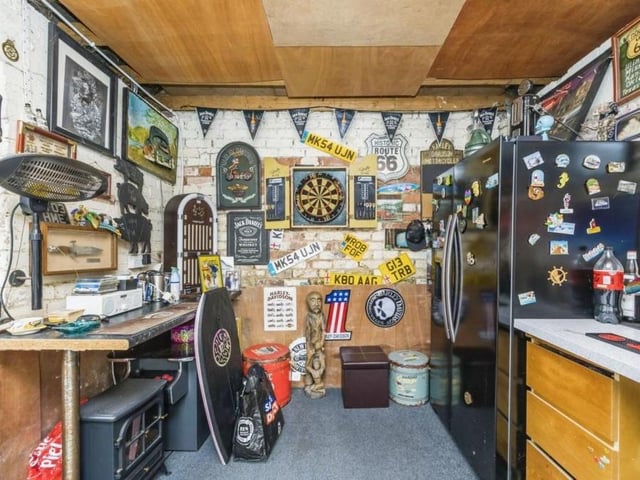 The courtyard leads to an outbuilding that has been turned into a busy bar. But it could also be used as a home office or a workshop, if you wish.