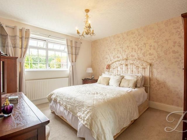 The second bedroom, which faces the back of the £475,000 house, has a touch of class about it.