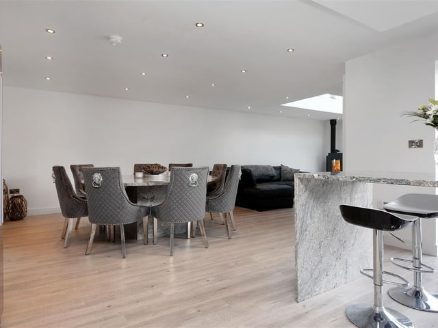 Ther room boasts underfloor heating, individual heating thermostat, ample ceiling spotlights, recess ceiling lighting and bi-fold doors leading out onto the west-facing rear garden.