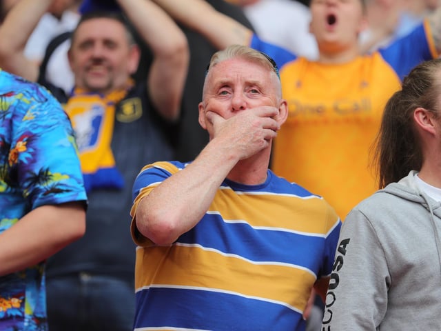 Mansfield Town fans watch the drama unfold inside Wembley