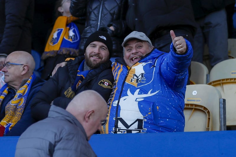 Stags beat Accrington 2-1 to seal a long-awaited promotion.