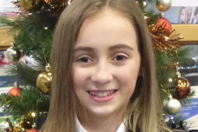 Ruby Giugno aged 11 who is making snow globes