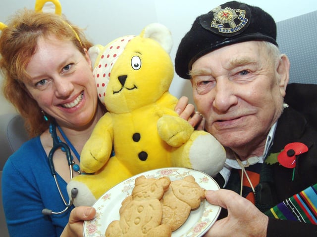 Dr Diana Rae of The John Eastwood Hospice baked cakes and biscuits to sell to patients and their families to raise funds for Children In Need in 2008. Dr Rae is pictured with patient Joe Steer at Ashfield Community Hospital.