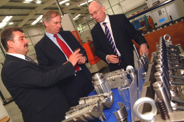 Ashfield MP Geoff Hoon, centre, visited R&D Engineering in Sutton on Friday to officially open the new factory. 
Mr Hoon is pictured during a tour of the premises with Managing Director Alan Tolley, left and Jeff Moore, right of EMDA.