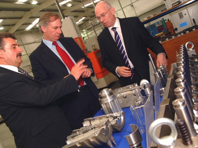 Ashfield MP Geoff Hoon, centre, visited R&D Engineering in Sutton on Friday to officially open the new factory.  Mr Hoon is pictured during a tour of the premises with Managing Director Alan Tolley, left and Jeff Moore, right of EMDA.
