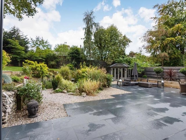 This is the view from the huge bi-fold doors in the open-plan living area. The back garden in all its glory.