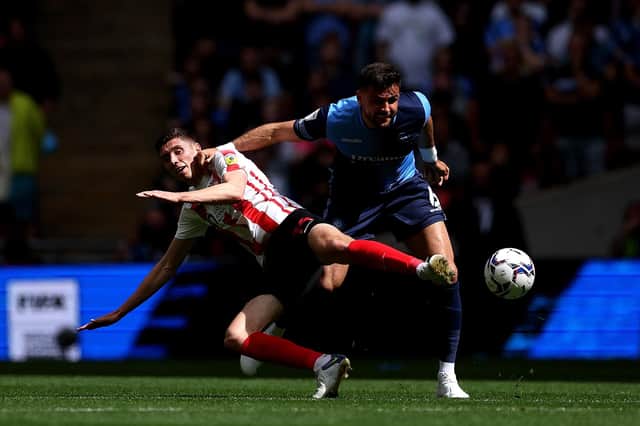 Former Mansfield Town defender Ryan Tafazolli was on the losing side after Sunderland beat Wycombe Wanderers to win the League One play-off final.