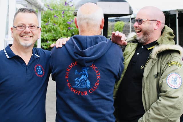 Nigel Pinnick is 'thrilled' with the turnout as he stands alongside Warsop syndicate scooter members.