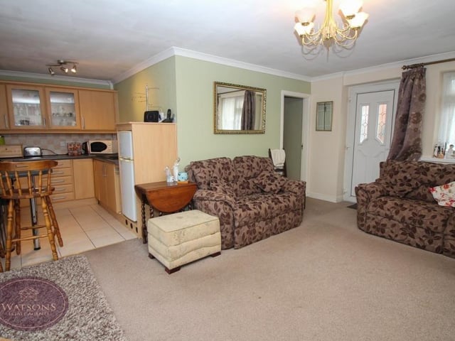 It's time now to have a look at the property's self-contained annexe. At its heart is an L-shaped, open-plan kitchen and living area.