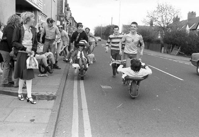 A wheelbarrow race through Forest Town