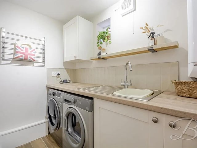 Completing the ground floor is a handy utility room.