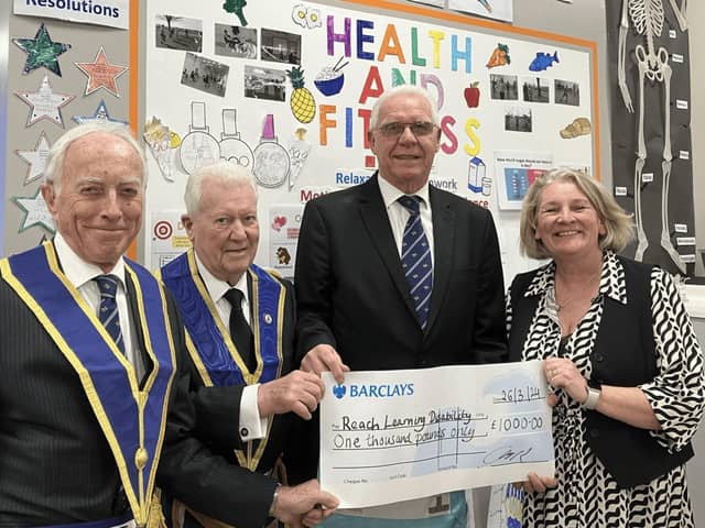 Broxtowe Lodge presenting a cheque to Maria Williams, Reach Mansfield Manager
