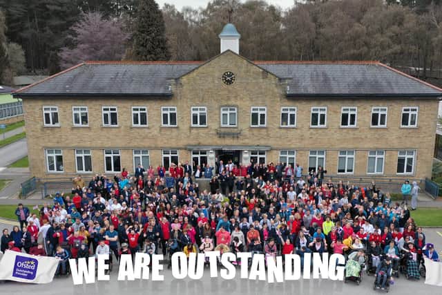 Portland College staff and students celebrating the outstanding rating from Ofsted in 2023