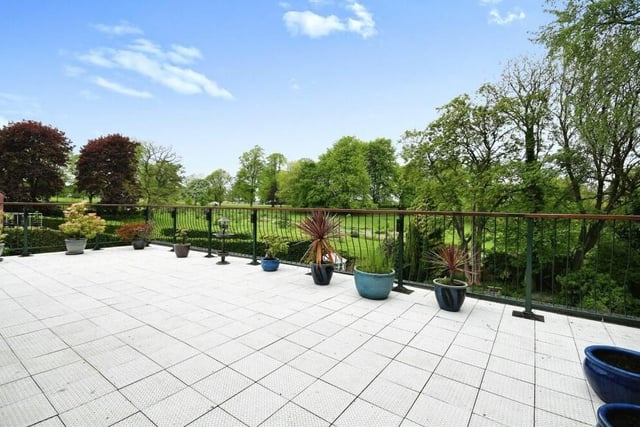 Here is the ground-floor terrace that offers stunning views not only of the back garden but also of Sutton Lawn pleasure ground.