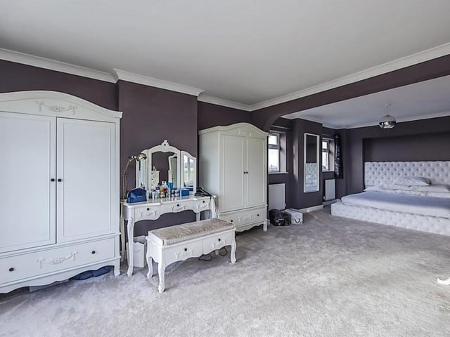 Take a look at the size of this master bedroom. It is a stunner with space for wardrobes, a dressing table and other furniture. There is access to an en suite bathroom.