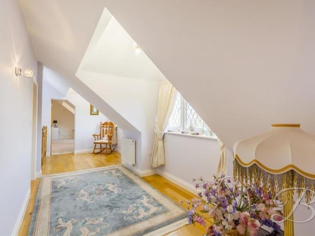 Arriving on the first floor, you are greeted by this landing at the Ravenshead property. It gives access to four of the six splendid bedrooms.,