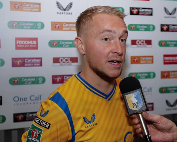 Mansfield Town midfielder Louis Reed post match interview following the Carabao Cup match against Grimsby Town FC at the One Call Stadium, 08 Aug 2023  
Photo credit : Chris & Jeanette Holloway / The Bigger Picture.media