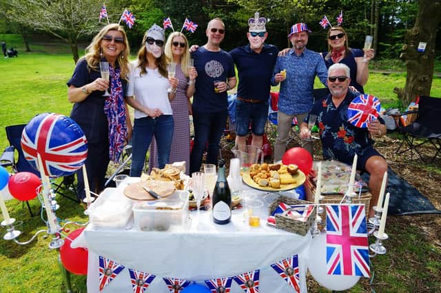 Mansfield's Berry Hill Park coronation event attracted visitors of all ages, including this group of friends, who were delighted to make a toast to the new King.