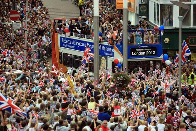 Becky Adlington enjoys the adulation of her home town on an open top bus tour after winning two golds in Beijing.
