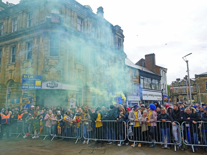 Crowds packed into Mansfield town centre this afternoon to salute their heroes.