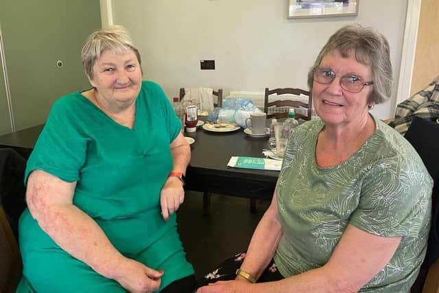 Rumbles charity manager Gina Dolan, left, with regular customer Annette Weightnan, aged 78. (Photo by: Local Democracy Reporting Service)