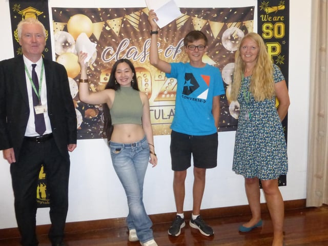 John Maher, headteacher, Grace Puntha, Joe Scarsbrook and Suzanne Guest, achievement leader for Year 11