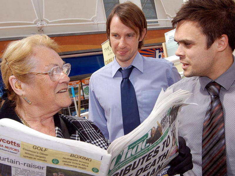 Sutton resident Mrs Edna Lewis chats with Chad reporters Chris Breese and Nick Brimacombe during a news surgery in the Idlewells Shopping Centre, 2010.
