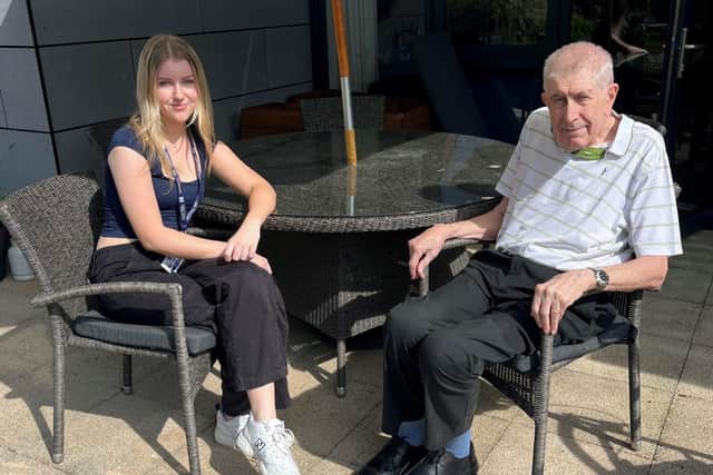 Toot Hill student Katie Harper with resident Bob Sandford
