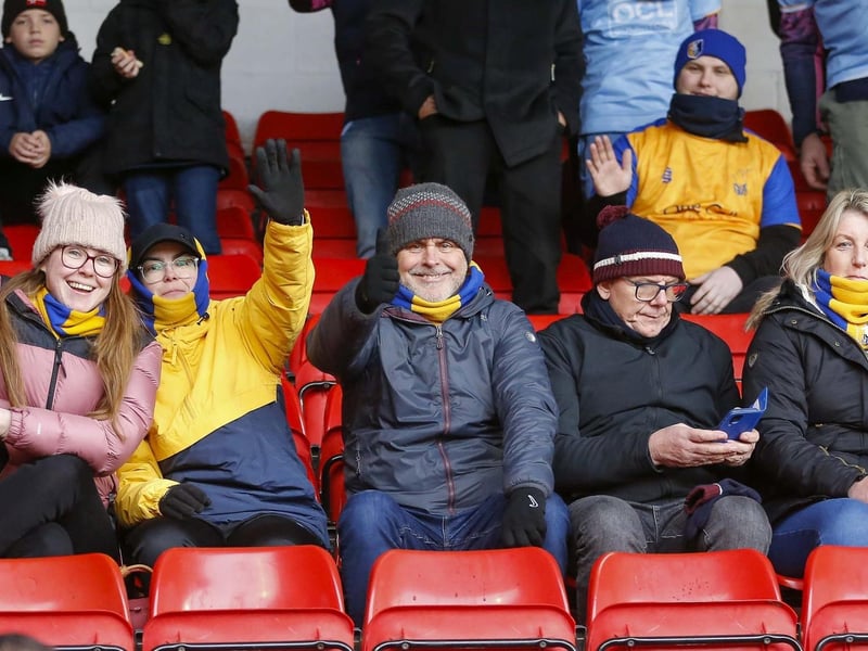 Stags fans watch the Sky Bet League 2 match against Walsall FC at the Bank's Stadium.