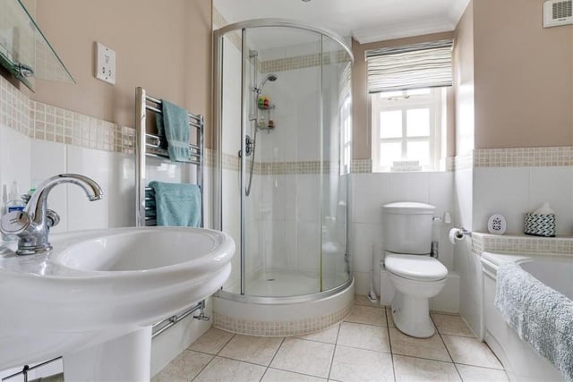 The family bathroom, which can be found on the first floor, consists of a delightful four-piece suite. Feast your eyes on a panelled bath, a corner fitted shower enclosure with mains-fed shower, low-flush WC and pedestal wash basin. And don't miss the chrome heated towel-rail, recessed spotlights and tiled flooring.