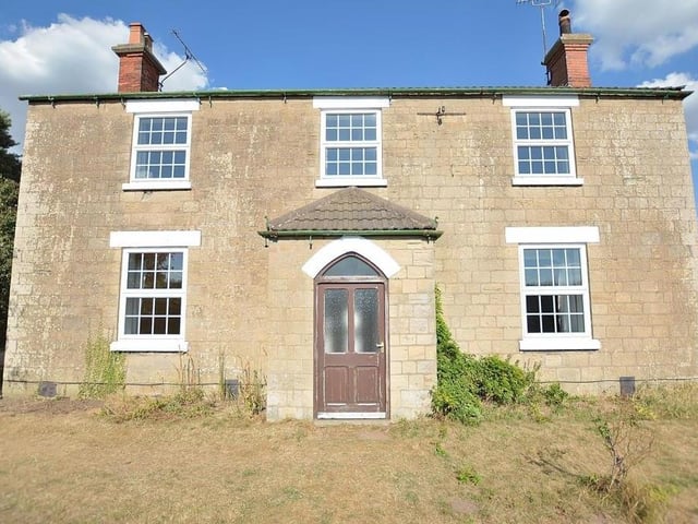 A closer look at the impressive facade of The Old Farmhouse at Three Thorn Hollow Farm in Rainworth.