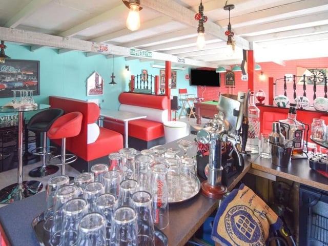 And here we are -- deep inside the 'man cave'. Look at the stylish decor. Time for next orders at the bar!