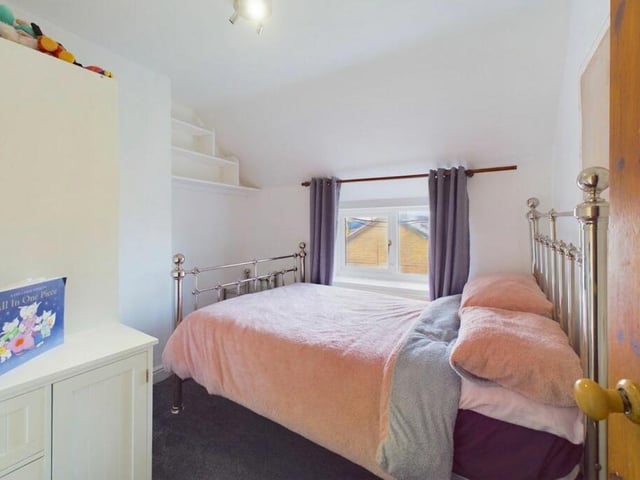 This bedroom is a cute, well-presented space.